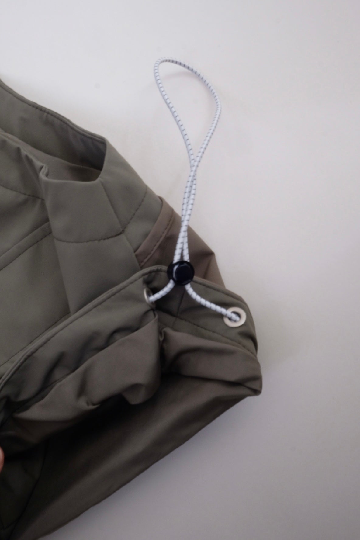 Draw cord high neck vest