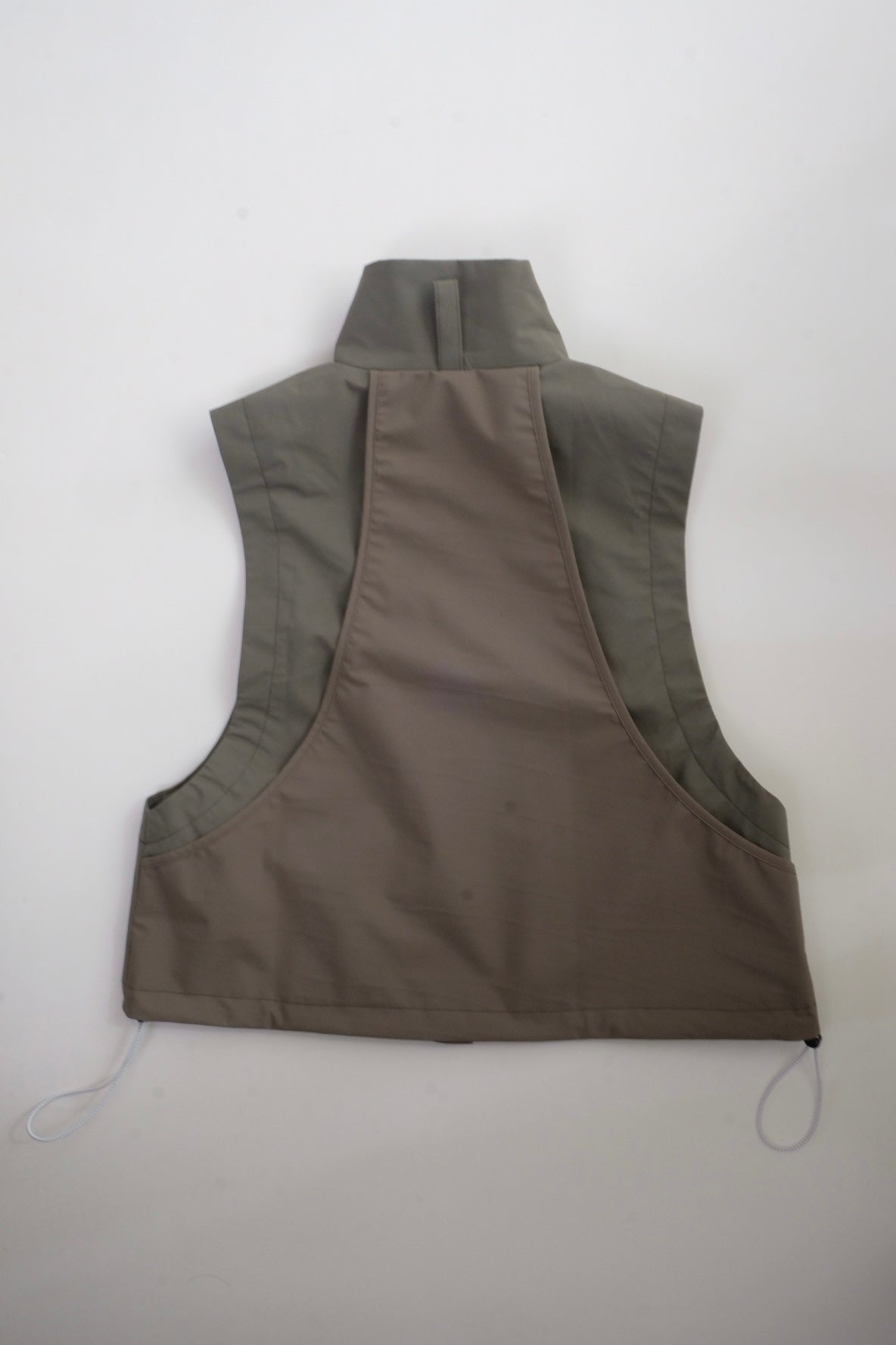 Draw cord high neck vest