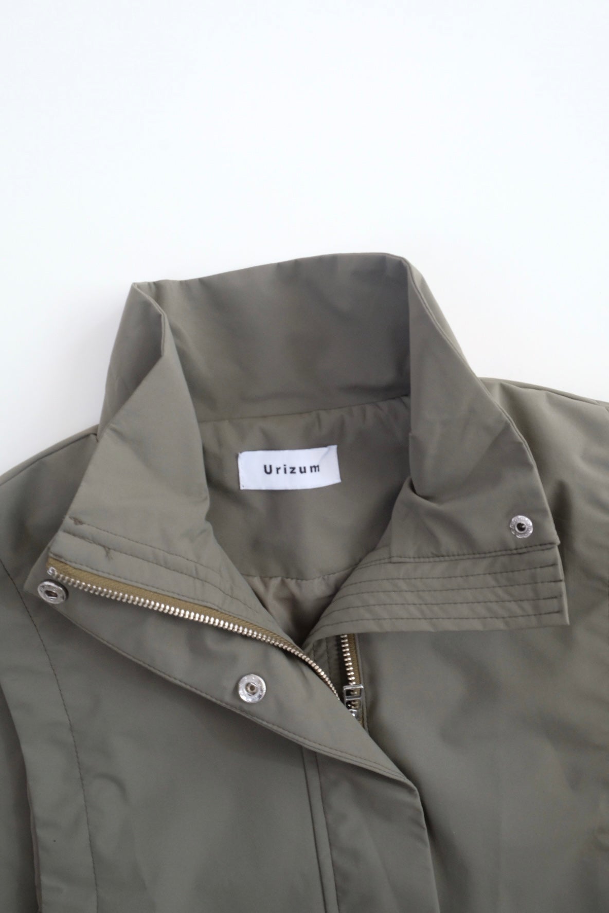 Draw cord high neck vest