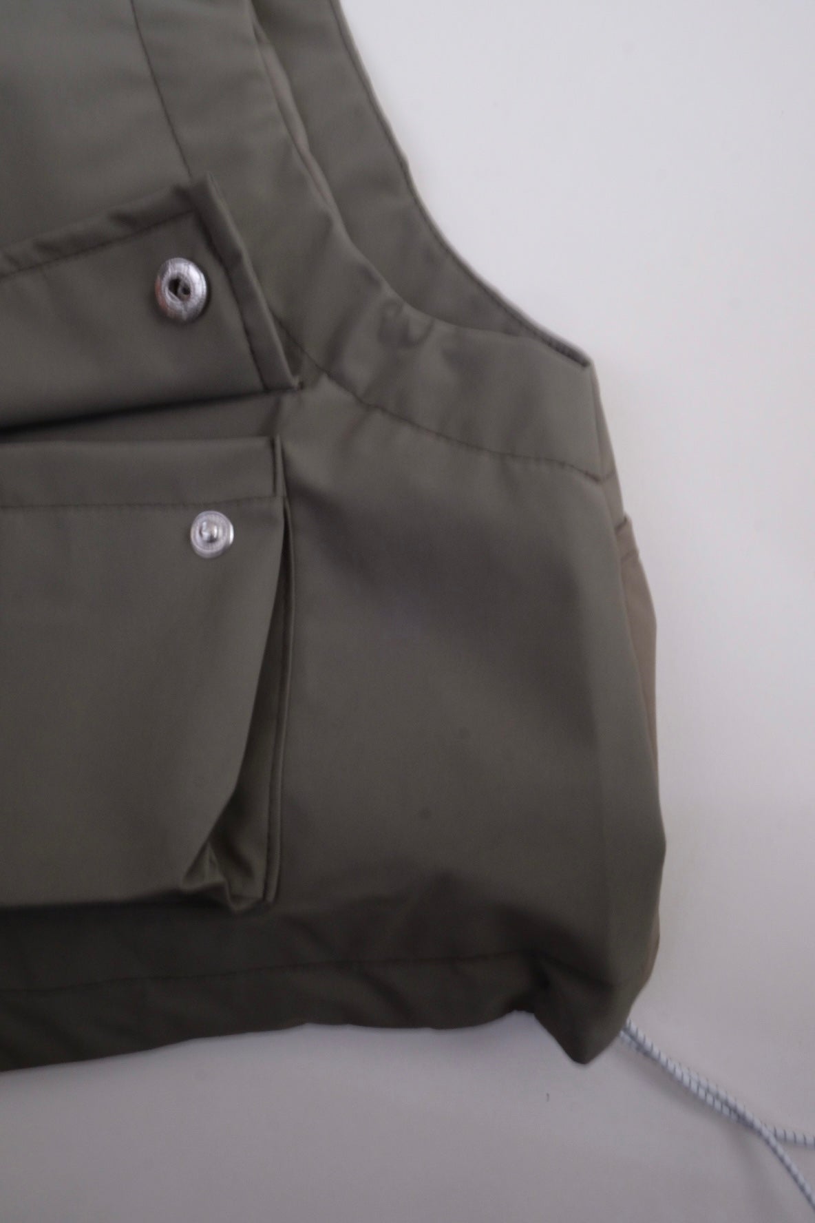 Draw cord high neck vest